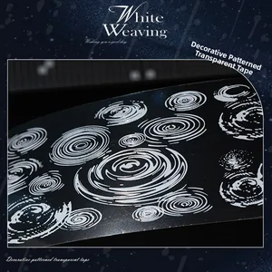Macro shot of waterproof PET tape with white concentric swirl patterns on black base