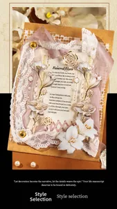 Close-up of vintage PET stickers featuring 3D lilies, lace ribbons, and pearl details