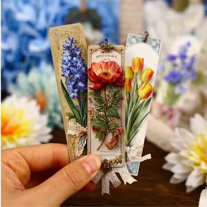 Retro floral paper bookmarks with lace ribbon and metal accents for journaling