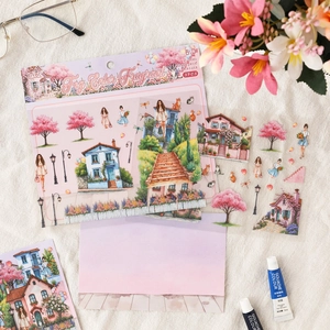 Floral Courtyard 3pcs DIY sticker set with stickers, a blue paint tube, and spectacles