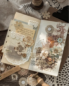 Detail of vintage Floral Whisper scrapbooking kit with lace and retro paper textures