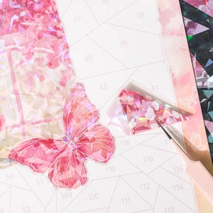 Dreamy hollow butterfly stickers with holographic texture and pink tweezers for journaling