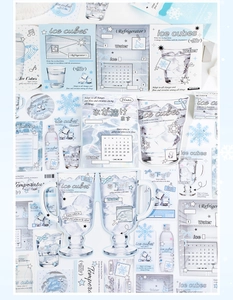 Detail of ice-themed aesthetic stickers with blue ice cubes and snowflake stationery elements