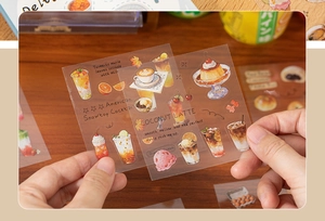 Vue rapprochée de stickers PET semi-transparents avec illustrations de nourriture faites main