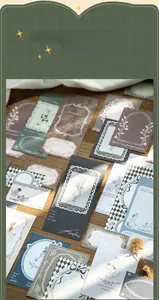 Macro shot of vintage fairy tale memo pads featuring Peter Rabbit and Pinocchio artwork