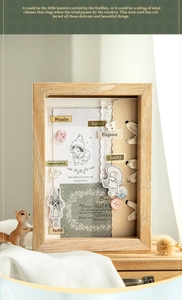 Detail of vintage fairy tale DIY scrapbook kit with lace, buttons and wooden frame
