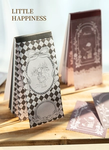 Detailed view of fairy tale theme memo pad with retro illustration and top binding