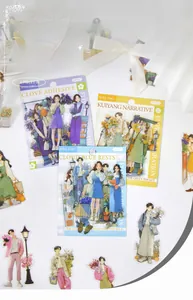 Close-up of Japanese style figure stickers for scrapbooking with floral illustrations