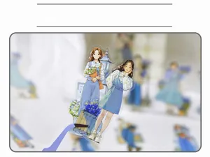 Close-up of Japanese style girl sticker being held by tweezers showing the die-cut detail