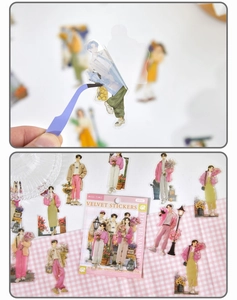 Close-up of translucent Japanese anime character stickers with pink floral elements