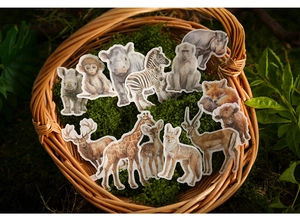 Macro detail of realistic watercolor forest animal stickers for DIY planners
