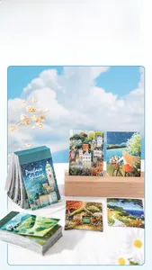 Dettaglio del libro di adesivi con paesaggi primaverili per scrapbooking DIY e diari