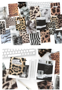 Detail of faux fur textured craft paper with leopard and zebra patterns for journaling