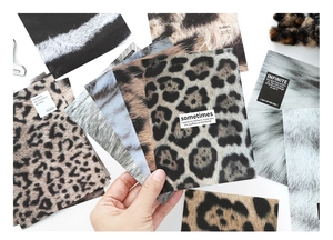 Macro shot of 40 animal print decorative stickers with inspirational English text