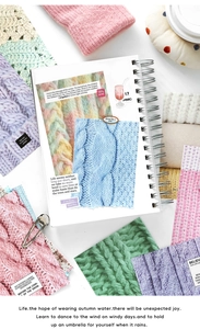Close-up of colorful chunky knit fabric samples with soft textures on a creative scrapbook