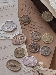 Detail of 3D embossed wax seal foam stickers with cat and coffee motifs in Morandi tones