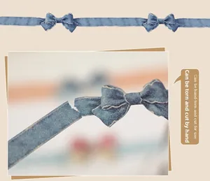 Detail of vintage denim style washi tape featuring bow patterns for DIY journaling