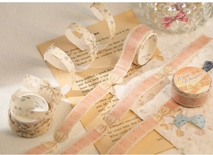 Detailed view of Woven Whispers bow tape with starry patterns and knitted textures