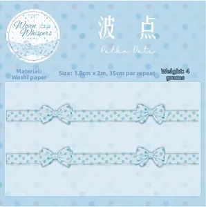 Detail showing 1.8cm light blue polka dot washi tape with bow pattern and specifications