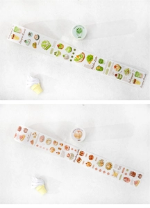 Detail view of dessert themed washi tape with matcha and strawberry pastry illustrations