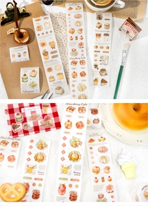 Macro view of vintage style washi tape featuring illustrations of bread, coffee and cakes