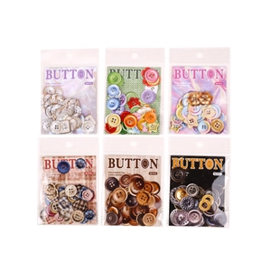 Pack de 6 con 50 botones retro en estilos de perla, macaron, tela y metal de época