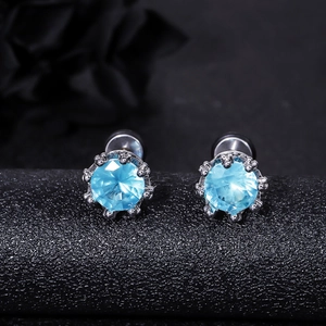 Elegant crown setting silver stud earrings with blue round-cut sparkling cubic zirconia