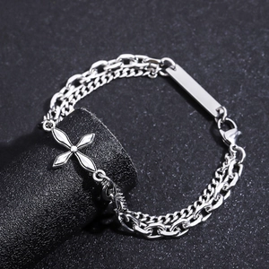 Titanium steel four-leaf clover bracelet with double chain design and polished metal plate