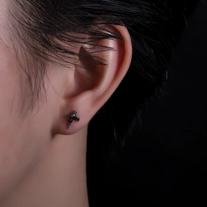 Dark gothic titanium steel stud earring featuring cross shape and red zircon accents