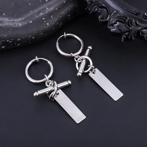 Polished silver rectangular tag earrings on a minimalist ring clip shown in macro detail