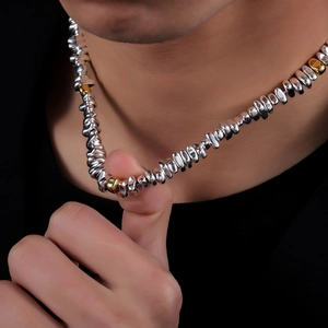 Luxurious silver hematite stone necklace with irregular metallic beads and gold accents