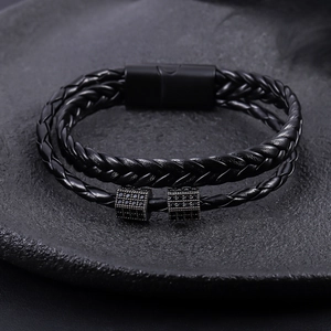 Double-layered black braided leather bracelet with matte magnetic clasp and CZ sliders