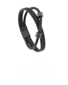 Detail of double-layer black braided leather bracelet with twin black stone metal sliders