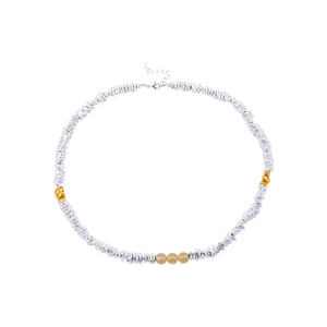 Beaded necklace with silver rings, gold accents and three yellow translucent gemstones