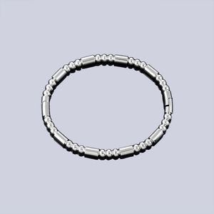 Bracelet à billes en acier poli avec fermoir caché élégant et finition miroir brillante