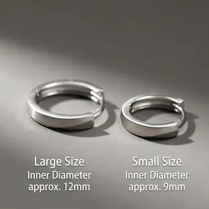 Boucles d'oreilles anneaux argentées pour hommes en tailles 9mm et 12mm sur gris