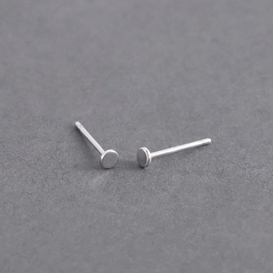 Minimalist silver geometric stud earrings for men and women with a polished finish