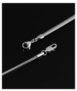 Detailed macro view of silver snake bone chain with sturdy lobster clasp closure