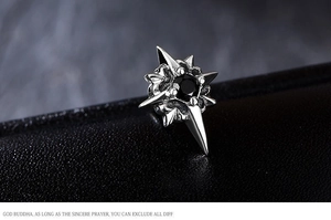 Macro shot of north star stud earring with black zircon and vintage silver finish