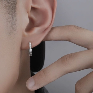 Men's minimalist irregular silver hoop earring with hammered texture and matte finish