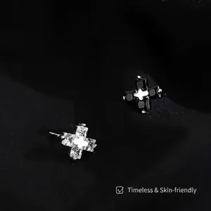 Sterling silver cross stud earrings for men featuring black and clear cubic zirconia
