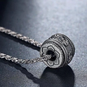 Vintage silver lotus cylinder pendant necklace with retro engraved details for men and women