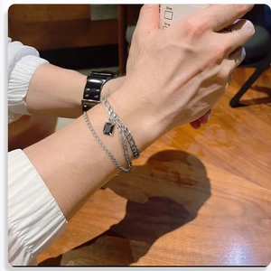 Men's double-layer titanium steel bracelet featuring a black gemstone rectangular pendant