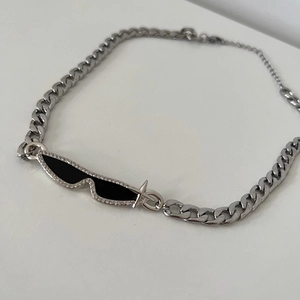 Y2K silver Cuban chain necklace with sparkling diamond-encrusted sunglasses pendant