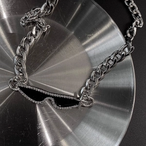 Titanium steel Cuban chain necklace featuring a rhinestone encrusted sunglasses pendant