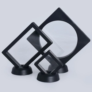 Three sizes of black PE film floating display boxes with round bases for jewelry storage