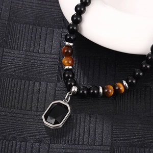 Men's tiger eye and obsidian beaded necklace with a black rectangular gemstone pendant