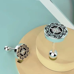 Gothic style cross star stud earrings in silver finish with black enamel detailing