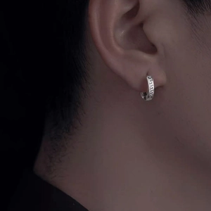 Men's titanium steel hoop earring featuring a classic Greek fret pattern on black background