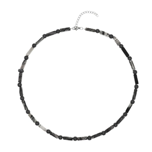 Neutral necklace with black and white marble textured beads and silver metal clasp